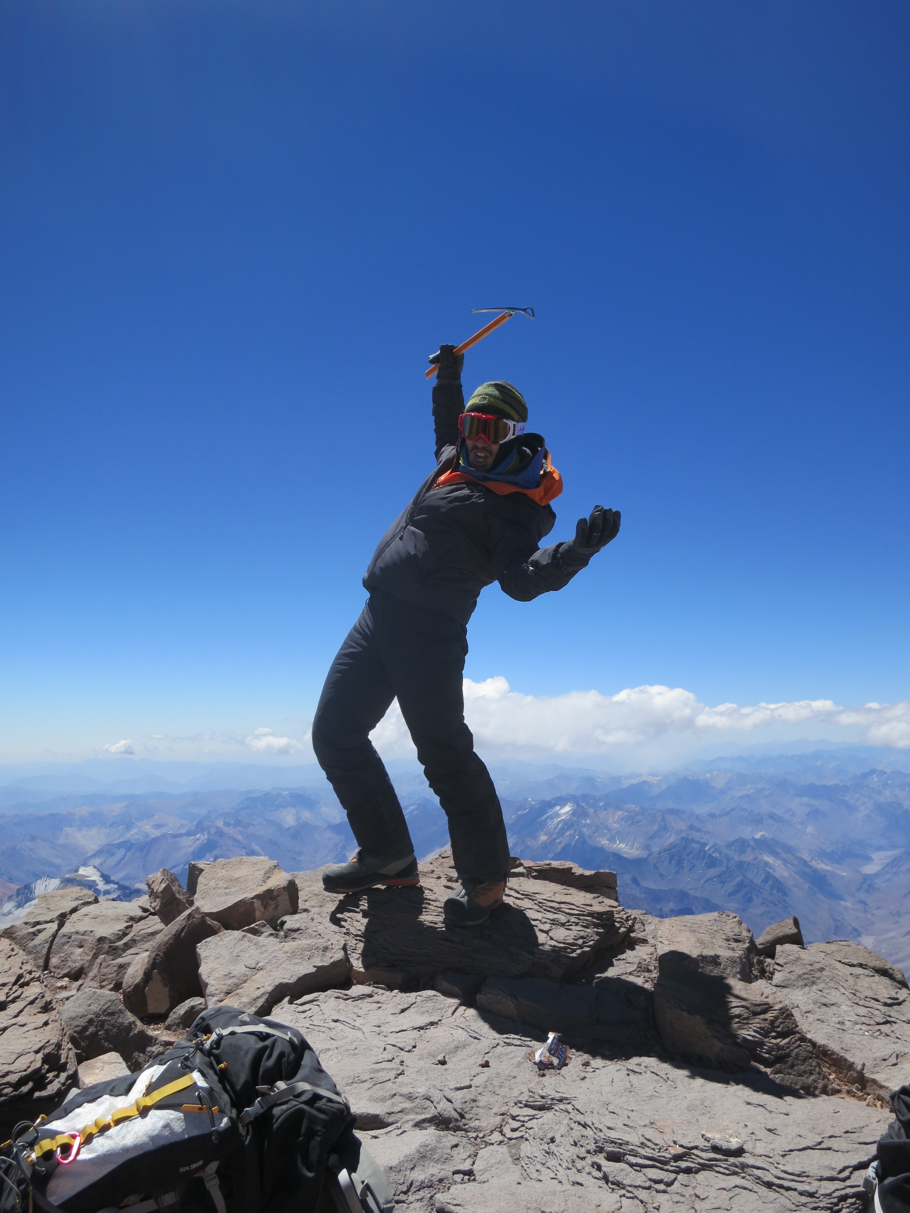 Laszlo at the summit of Aconcagua with ice axe